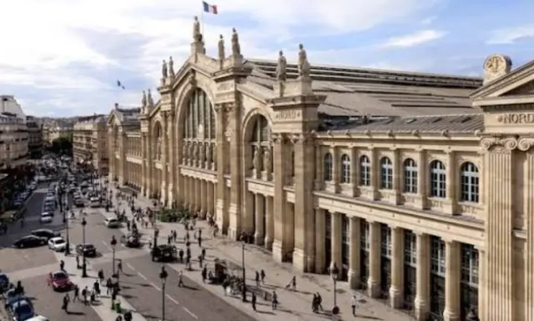 Paris Gare du Nord concourse with departure boards and travelers