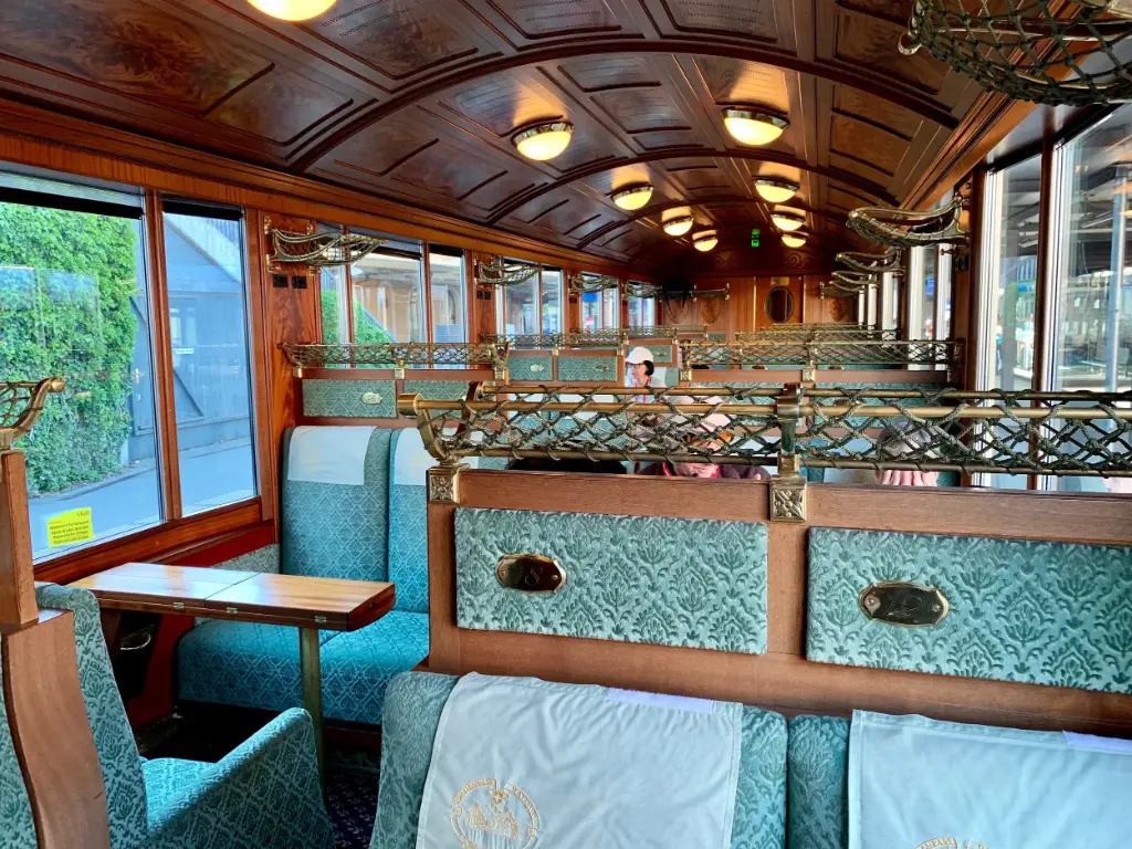 The Swiss Chocolate Train Interior photo of an old, luxurious carriage (wood and velvet)